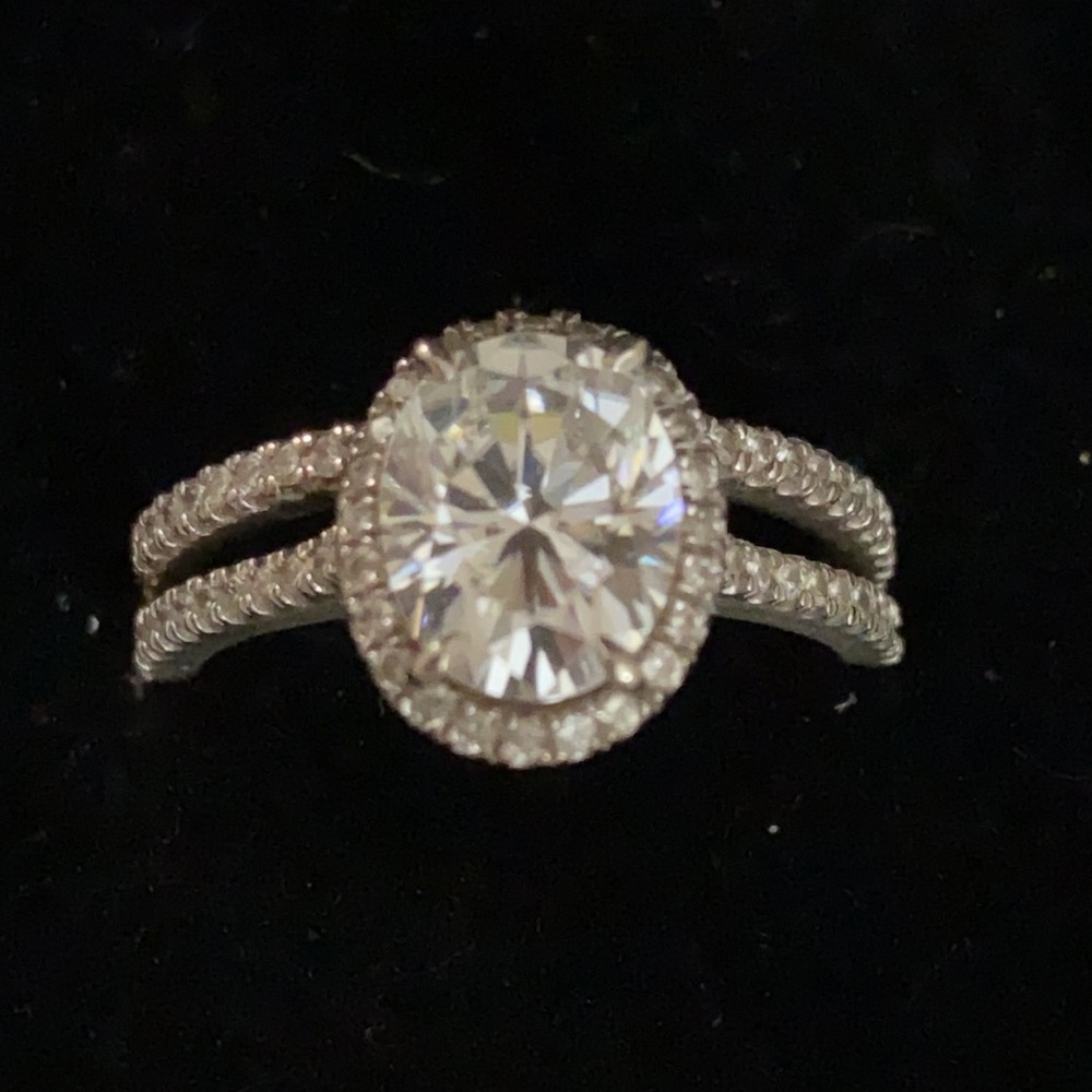 My gorgeous engagement ring & matching wedding band saw seven 2 3/8 ct